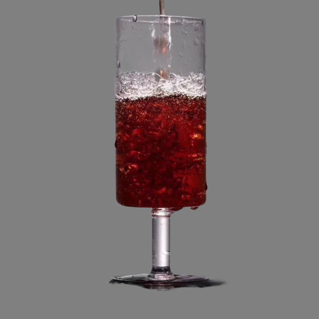 HANDMADE FOOTED GLASS TEA CUP