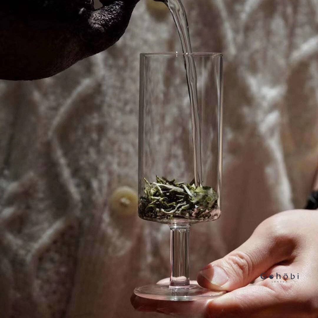 HANDMADE FOOTED GLASS TEA CUP