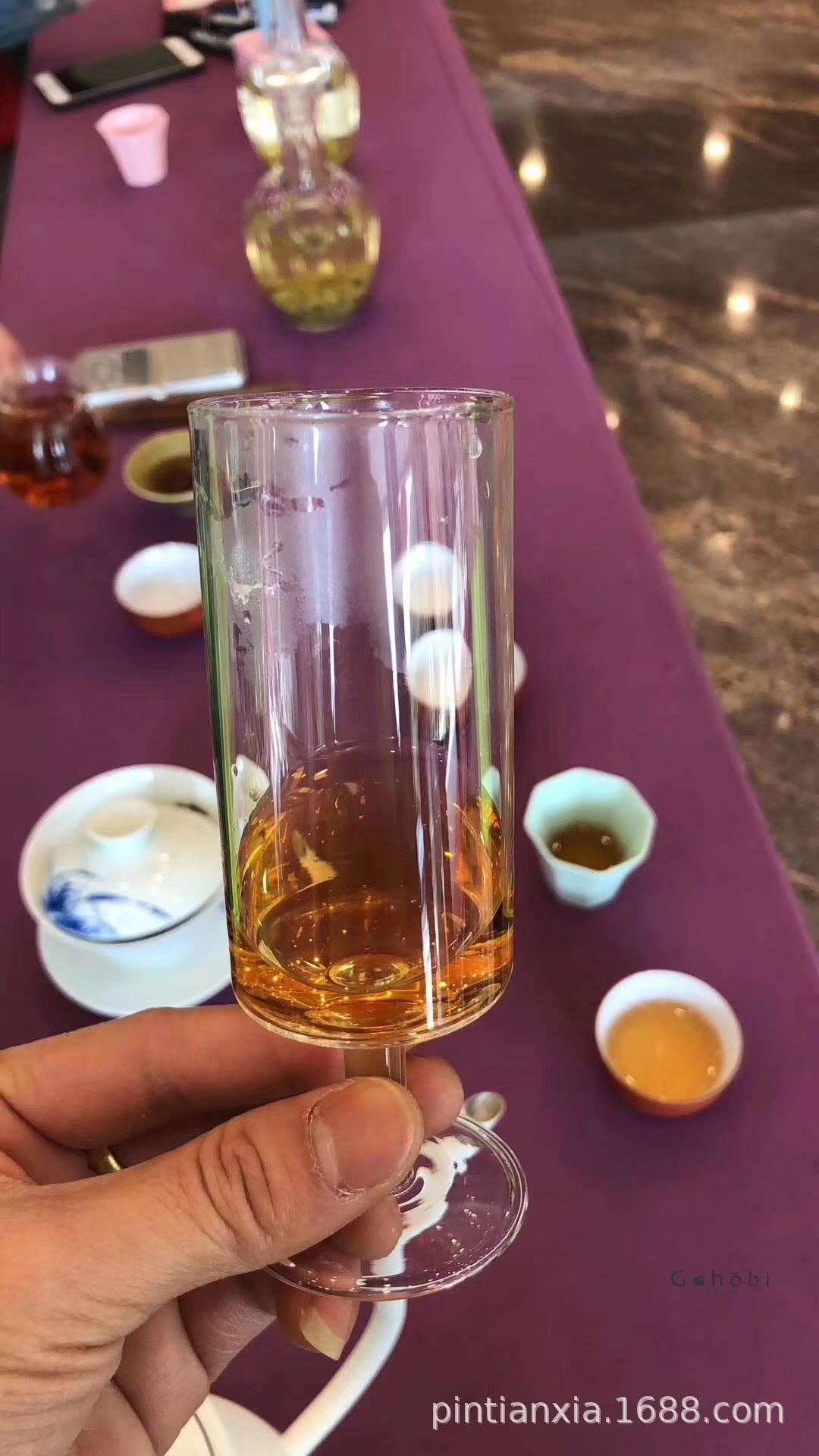HANDMADE FOOTED GLASS TEA CUP