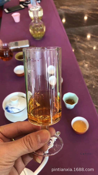 HANDMADE FOOTED GLASS TEA CUP