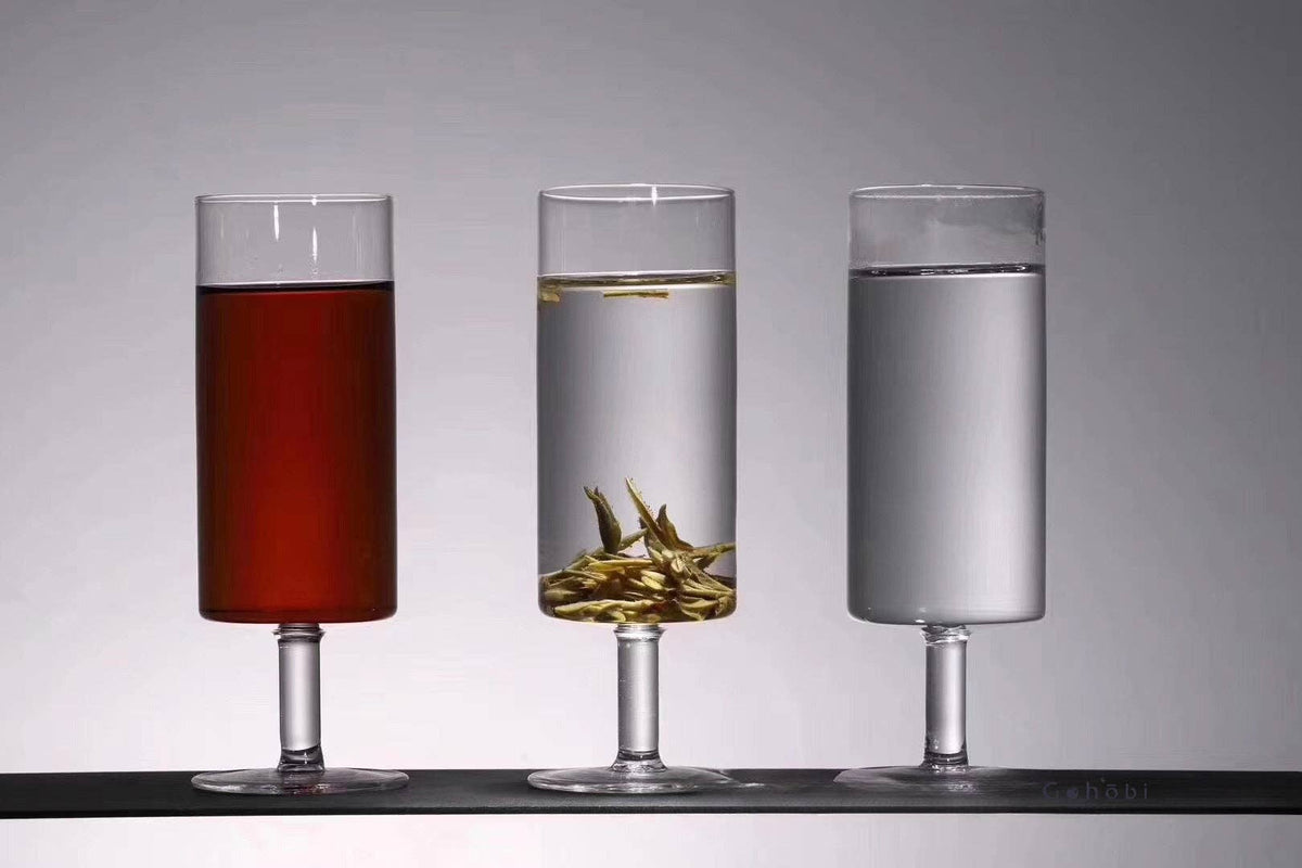 HANDMADE FOOTED GLASS TEA CUP