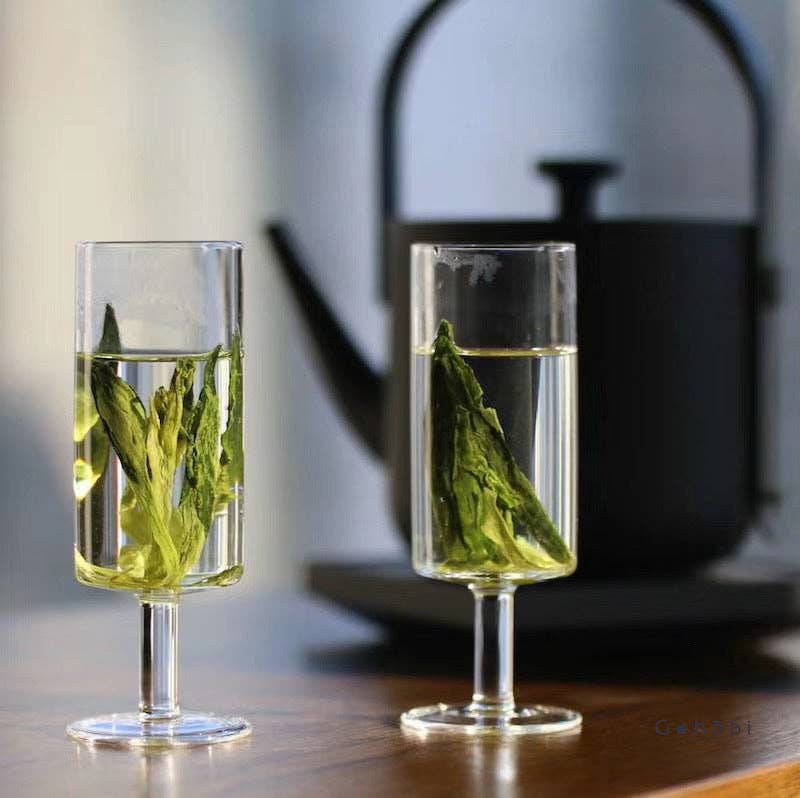 HANDMADE FOOTED GLASS TEA CUP