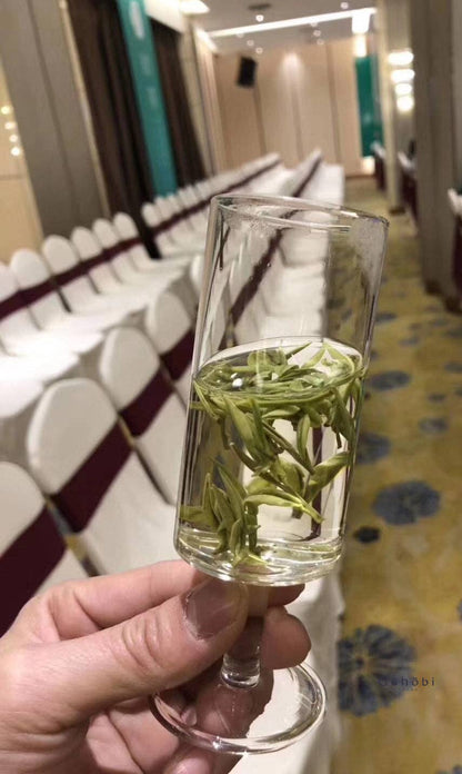 HANDMADE FOOTED GLASS TEA CUP