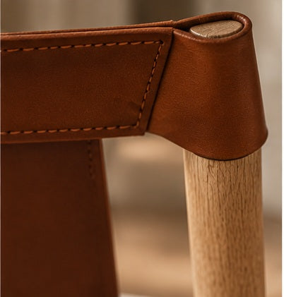 PISINOE LEATHER CHAIR ("THE PERSUASIVE ONE")